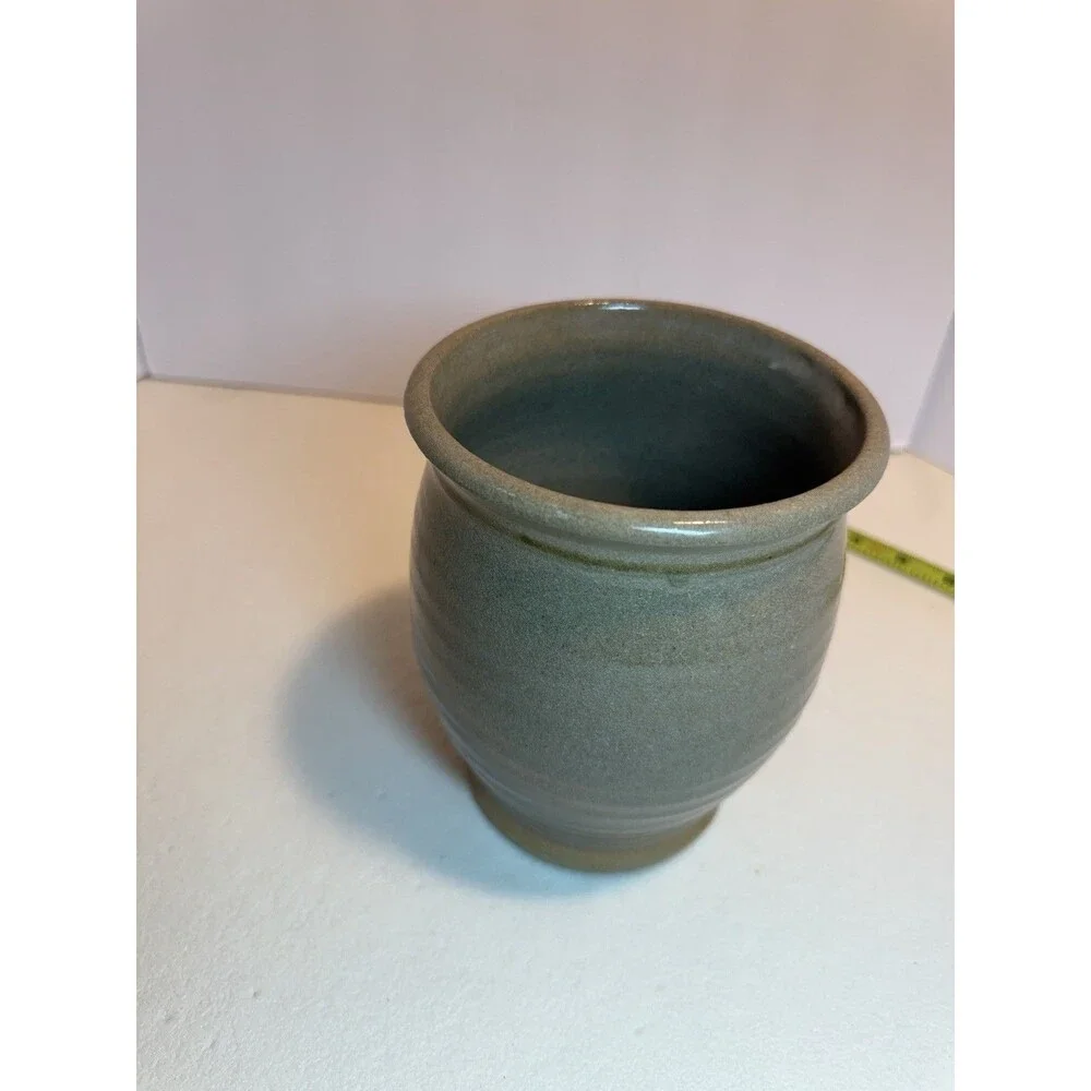 Studio art pottery pot. Vintage rustic brown with blue flowers